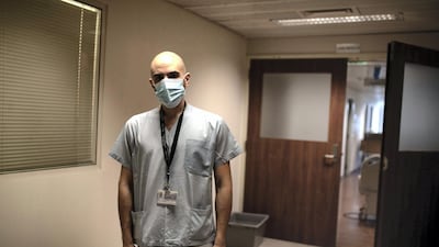 Oday Hamad, a nurse at the Coronavirus intensive care unit at the American University of Beirut (AUB) Hospital poses for a portrait. Tom Nicholson for The National