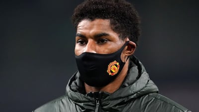 Manchester United striker Marcus Rashford leaves the pitch after the final whistle. AFP