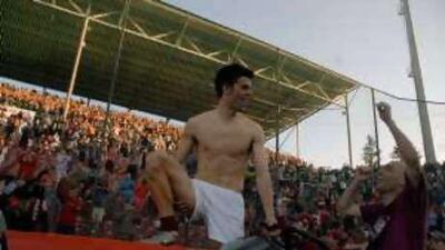 Cluj players celebrate winning the Romanian title.