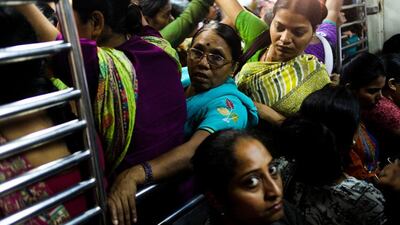 Ladies Only - Karen Dias. 'Containing hundreds of commuters sleeping, eating, chopping vegtables, praying, singing, studying,'