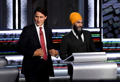 Canadian Prime Minister Justin Trudeau and NDP leader Jagmeet Singh take part in an election debate in Gatineau, Canada, in 2021. Reuters