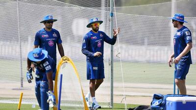 ABU DHABI , UNITED ARAB EMIRATES – April 15 , 2014 : Rohit Sharma ( center ) , Captain of Mumbai Indians IPL team during the practice session at Zayed Cricket stadium in Abu Dhabi. ( Pawan Singh / The National ) For Sports