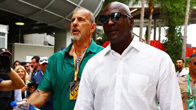Basketball legend Michael Jordan walks in the paddock prior to the F1 Grand Prix of Miami. Getty