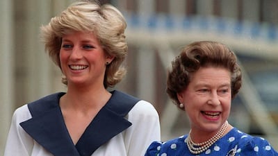 Diana, Princess of Wales, left, and Britain’s Queen Elizabeth II as they smile to well-wishers outside Clarence House in London on August 4, 1987. Martin Cleaver / AP photo