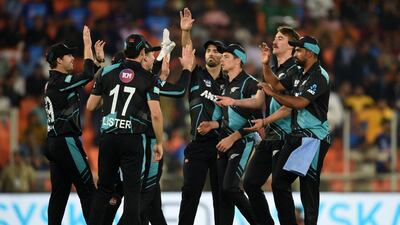 New Zealand's players celebrate after the dismissal of India's Suryakumar Yadav. AFP