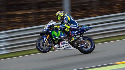 MotoGP Italian rider Valentino Rossi drives during the second training session for the Grand Prix of Germany at the Sachsenring Circuit on July 15, 2016 in Hohenstein-Ernstthal, eastern Germany. AFP / Robert MICHAEL