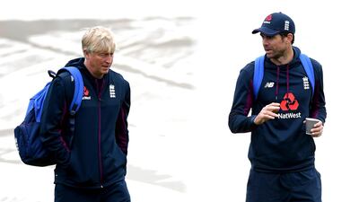 England's James Anderson speaks to bowling coach Glen Chapple in Manchester. PA