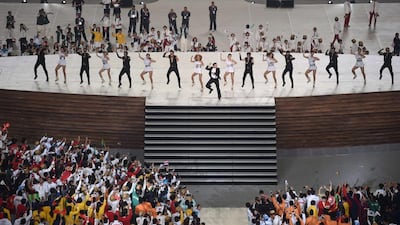 South Korean pop star Psy, centre, dance the 2014 Asian Games into action at the Incheon Asiad Main Stadium on September 19, 2014. Ed Jones / AFP