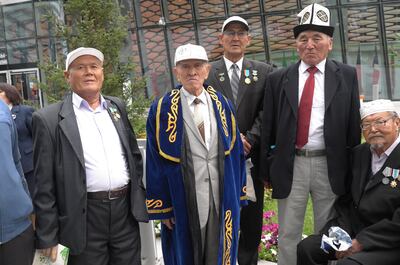 Old soldiers never die - they just go to Expos. A group of elderly Kazakhstan war veterans in traditional dress visit Expo 2017. James Langton / The National
