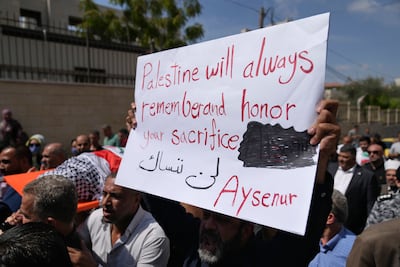 Mourners carry the body of Aysenur Eygi during her funeral procession in the West Bank city of Nablus on Monday. AP