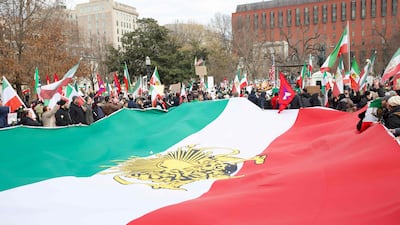 Demonstrators protesting against the deadly crackdown in Iran display a large Iranian opposition flag outside the White House in Washington on January 17. AFP