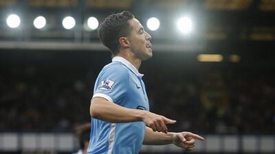 Samir Nasri celebrates after scoring Manchester City's second goal on Sunday in their 2-0 victory over Everton. Andrew Yates / Reuters