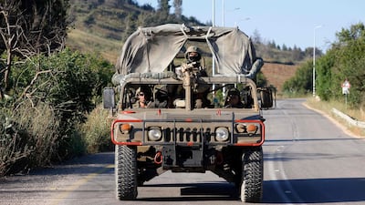 An Israeli army patrol near the Lebanese border. AFP