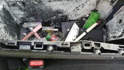 Dry shampoo was among several other beauty products stored in the middle console of the car