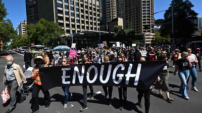 Protesters attend a rally against sexual violence and gender inequality in Sydney on March 15, 2021. AFP