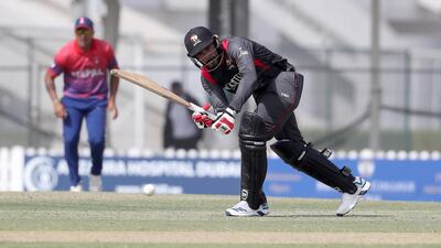 Chundangapoyil Rizwan of UAE plays a shot. Pawan Singh/The National