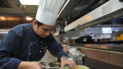 A chef preparing a Halal meal at the Gaia Hotel, which caters to tourists from Muslim-dominant countries, in the Beitou district near Taipei. Mandy Cheng / AFP