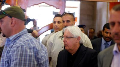 UN envoy to Yemen Martin Griffiths is escorted by bodyguards during his departure at Sanaa airport in Sanaa, Yemen, on June 5, 2018. Khaled Abdullah / Reuters
