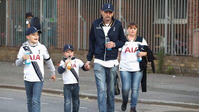 Spurs fans arrive prior to the League Cup third round match against Gillingham at White Hart Lane. Julian Finney / Getty Images