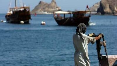 A labourer works in the street near Sultan Qaboos Port in Muscat. Summer heat often takes a heavy toll on the health of workers.