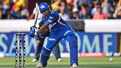 Rohit Sharma prepares to play a shot during his innings for the Mumbai Indians.