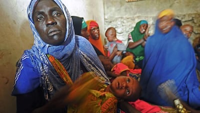 Displaced Somali women and their children receive medical treatment on the outskirts of Mogadishu. Mohamed Abdiwahab / AFP