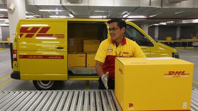 DHL’s new head office and logistics centre features a 300-metre long conveyor and sorting belt and offers more than 10 times the space that was previously available. Pawan Singh / The National