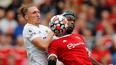 Manchester United's Paul Pogba fights for the ball with Leeds United's Luke Ayling.