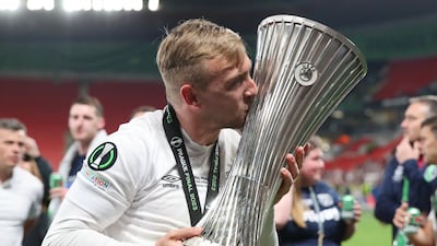 Jarrod Bowen kisses the Europa Conference League trophy after the team's victory against Fiorentina. Getty