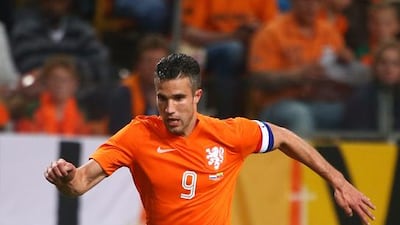 Robin van Persie, striker (Manchester United); Age 30; 82 caps. Scored 11 goals in the 2014 World Cup qualifiers, breaking the overall Dutch scoring record in the process by taking his tally to 41 - exactly one goal every two games for his country. Captain of the national team since last year and enjoys a close relationship with coach Van Gaal. Controversially moved from Arsenal to Manchester United to win trophies and took the league in his first season but has suffered only disappointment and injury in the current campaign, the highlight being his hat-trick against Olympiakos in the Champions League. Charlie Crowhurst / Getty Images
