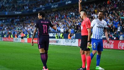Barcelona's Neymar J is shown a red card during the Primera Liga match against Malaga at La Rosaleda stadium on April 8, 2017 in Malaga, Spain. David Ramos / Getty Images