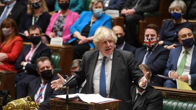 Britain's Prime Minister Boris Johnson gestures during Prime Minister's Questions in the House of Commons in London. UK Parliament / AFP