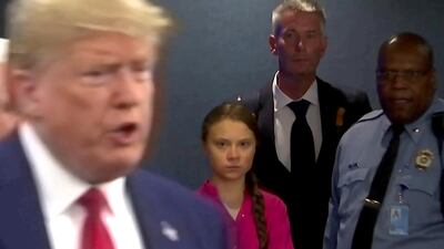 Swedish environmental activist Greta Thunberg gives US President Donald Trump a withering look as he enters the United Nations in New York City. Reuters