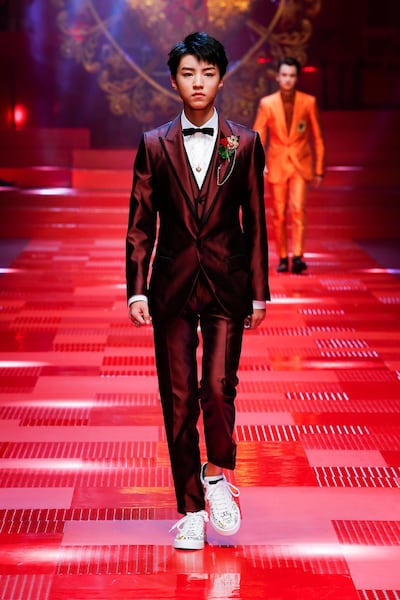 Dolce & Gabbana mixed a sharp suit with white footwear for SS18