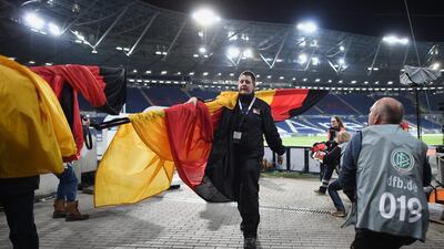 Police evacuate the HDI Arena prior to the friendly match between Germany and Netherlands. Getty Images