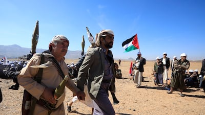 Houthi fighters attend a gathering at the end of a military training session, on the outskirts of Sanaa, Yemen. EPA