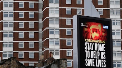A UK government public health campaign message is displayed on a billboard in West London, as the spread of the coronavirus disease (COVID-19) continues, London, Britain, April 1, 2020. REUTERS/Toby Melville