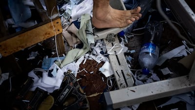 Pieces of fabric strewn around inside the busy workshop of Ghazal Al Madeena Men Tailoring