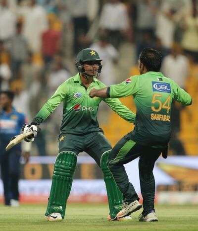 Shadab Khan, left, after hitting the match-winning six. Kamran Jebreili / AP Photo