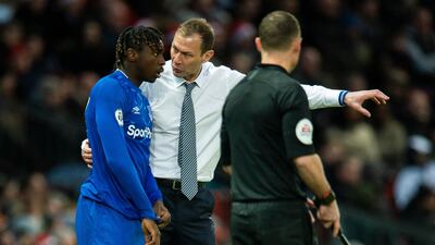 Everton caretaker manager Duncan Ferguson gives substitute Moise Kean instructions. EPA