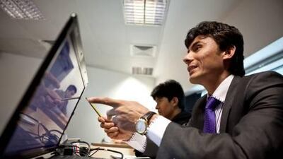 Future Afghan ambassador Abdul Bashir Pazhwak speaks during his international political economics class as part of the training programme.