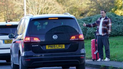 A passenger near Gatwick Airport. PA