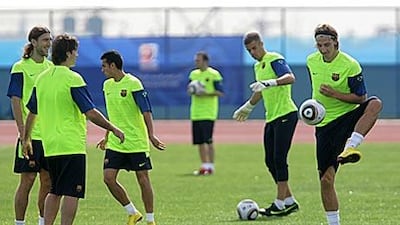 Barca players, including Zlatan Ibrahimovic, right, train at Abu Dhabi's Officer's Club yesterday.