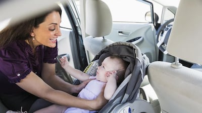 Fitting a car seat is a motoring necessity for parents. iStockphoto.com