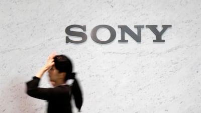 The Sony logoat its headquarters in Tokyo . The company has seen its profits plunge. Yuya Shino / Reuters