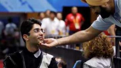 The gold medal won by Abhinav Bindra, left, comes at a critical time in Indian sport.