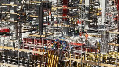 Around 12,000 construction workers are working on the Midfield Terminal project. Mona Al Marzooqi / The National