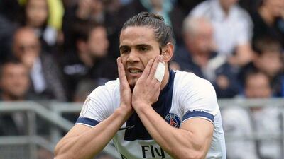 Edinson Cavani reacts during Paris Saint-Germain's 1-1 draw with Sochaux on Sunday. Patrick Hertzog / AFP / April 27, 2014