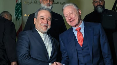 Abbas Araghchi, left, Iranian Foreign Minister, shakes hands with his Lebanese counterpart, Youssef Raggi, at the Foreign Ministry in Beirut. EPA