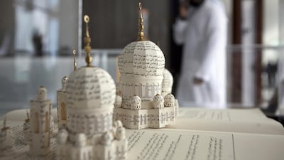 The mosque model, which took about two weeks to complete, is built out of an Arabic translation of the 1001 Arabian Nights book. Silvia Razgova / The National